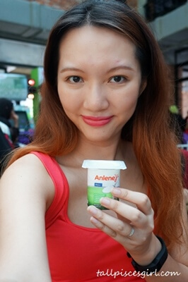 Indulging in Anlene Movemax Yoghurt after the physical tests