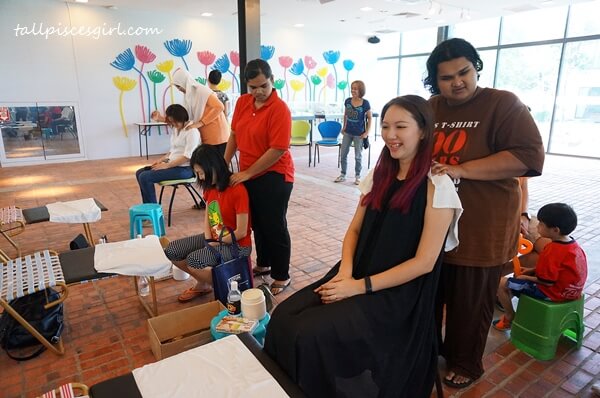 Neck and shoulders massage performed by blind masseurs